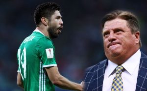 Oribe Peralta y Miguel Herrera | Getty Images
