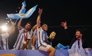 LUSAIL CITY, QATAR – DECEMBER 18: Nicolas Tagliafico and Lautaro Martinez of Argentina celebrate after winning the FIFA World Cup on an open top bus outside the stadium after the FIFA World Cup Qatar 2022 Final match between Argentina and France at Lusail Stadium on December 18, 2022 in Lusail City, Qatar. (Photo by Mohamed Farag/Getty Images)
