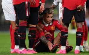 MANCHESTER, ENGLAND – APRIL 13: Lisandro Martinez of Manchester United goes down with an injury during the UEFA Europa League quarterfinal first leg match between Manchester United and Sevilla FC at Old Trafford on April 13, 2023 in Manchester, England. (Photo by Shaun Botterill/Getty Images)
