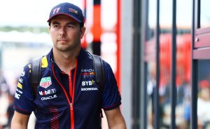 NORTHAMPTON, ENGLAND – JULY 06: Sergio Perez of Mexico and Oracle Red Bull Racing walks in the Paddock during previews ahead of the F1 Grand Prix of Great Britain at Silverstone Circuit on July 06, 2023 in Northampton, England. (Photo by Mark Thompson/Getty Images)
