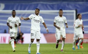 MADRID, SPAIN – JANUARY 26: Rodrygo Goes of Real Madrid celebrates after scoring their first side goal during the Copa Del Rey Quarter Final match between Real Madrid and Atletico de Madrid at Estadio Santiago Bernabeu on January 26, 2023 in Madrid, Spain. (Photo by Florencia Tan Jun/Getty Images)
