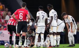 BILBAO, SPAIN – AUGUST 12: Eder Militao of Real Madrid goes down with an injury during the LaLiga EA Sports match between Athletic Club and Real Madrid CF at Estadio de San Mames on August 12, 2023 in Bilbao, Spain. (Photo by Juan Manuel Serrano Arce/Getty Images)
