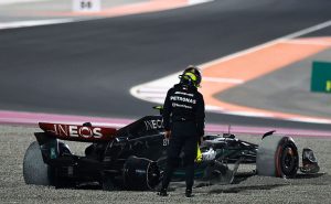 LUSAIL CITY, QATAR – OCTOBER 8: Lewis Hamilton of Great Britain stands by his Mercedes-AMG PETRONAS F1 Team after colliding with George Russell (not in picture) during the F1 Grand Prix of Qatar at Lusail International Circuit on October 8, 2023 in Lusail City, Qatar. (Photo by Qian Jun/MB Media/Getty Images)
