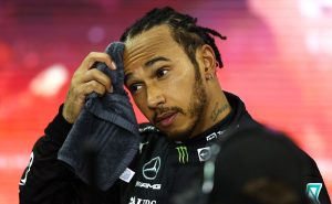 ABU DHABI, UNITED ARAB EMIRATES – DECEMBER 12: Second placed and  championship runner up Lewis Hamilton of Great Britain and Mercedes GP looks dejected in parc ferme  during the F1 Grand Prix of Abu Dhabi at Yas Marina Circuit on December 12, 2021 in Abu Dhabi, United Arab Emirates. (Photo by Bryn Lennon/Getty Images)
