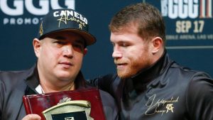 Eddy Reynoso y Canelo Álvarez