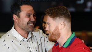 Óscar de la Hoya y Canelo Álvarez.